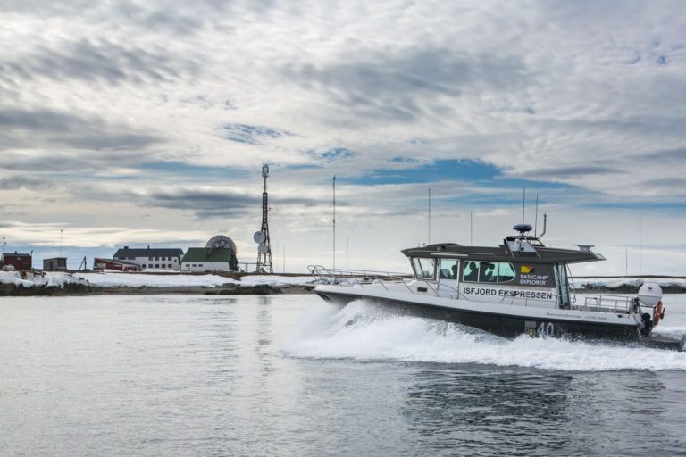 The boat journey to Isfjord radio allows you to take in the mountain and glacier views while looking out for aquatic wildlife © Freddy Karlsson