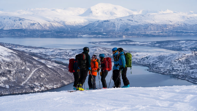 Heading up to Mount Buren with a certified guide. Parts of Tromsø are seen in the background. Photo: Lars Petter Jonassen / nordnorge.prod.dekodes.no